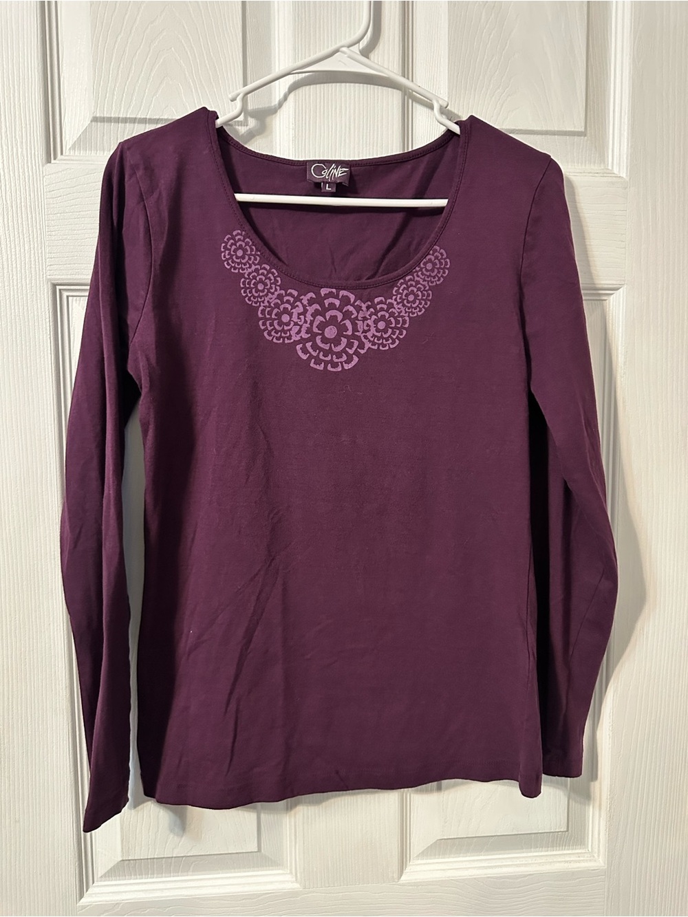 Purple long-sleeve top by Coline